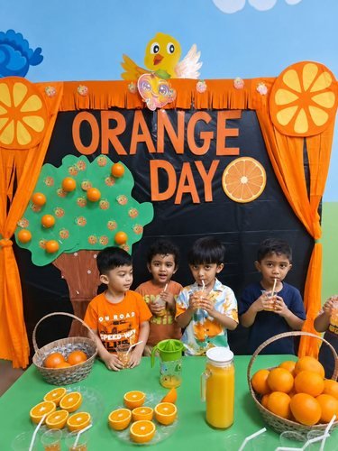 Children taking part in an 'Orange Day' themed classroom activity